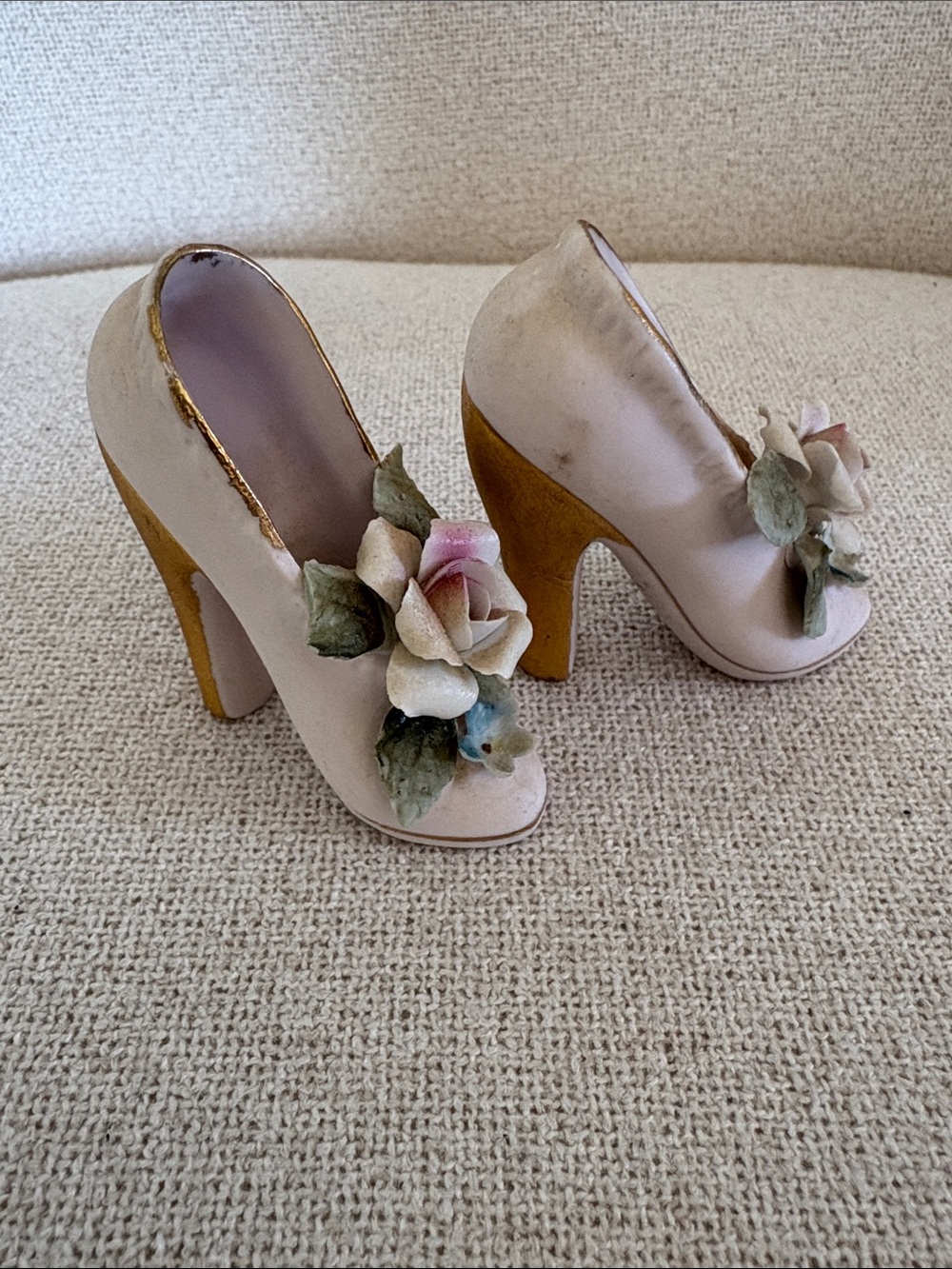 Vintage Japanese porcelain miniature shoe with a hand-painted floral design.
